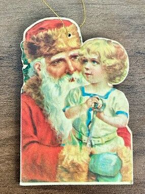 VINTAGE Merrimack Victorian Style Old World Santa Child Die Cut Ornament 1977